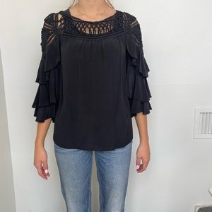 Phillip Lim silk blouse with cut out detailing and ruffled sleeves.